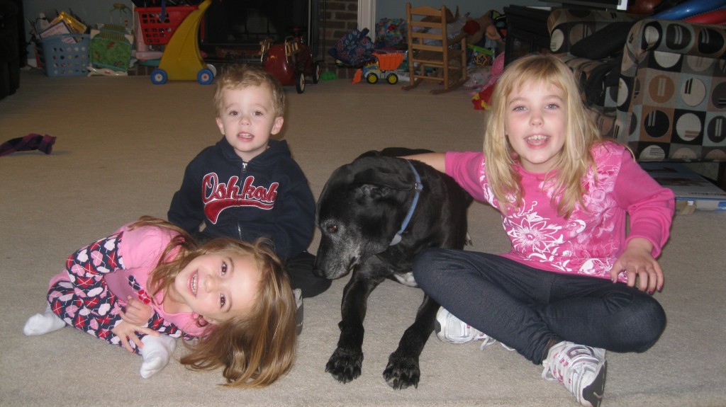 Maddie at 8 with her 3 siblings.