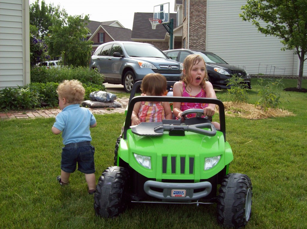 Maddie at 7, the last year she could comfortably fit into her jeep. 
