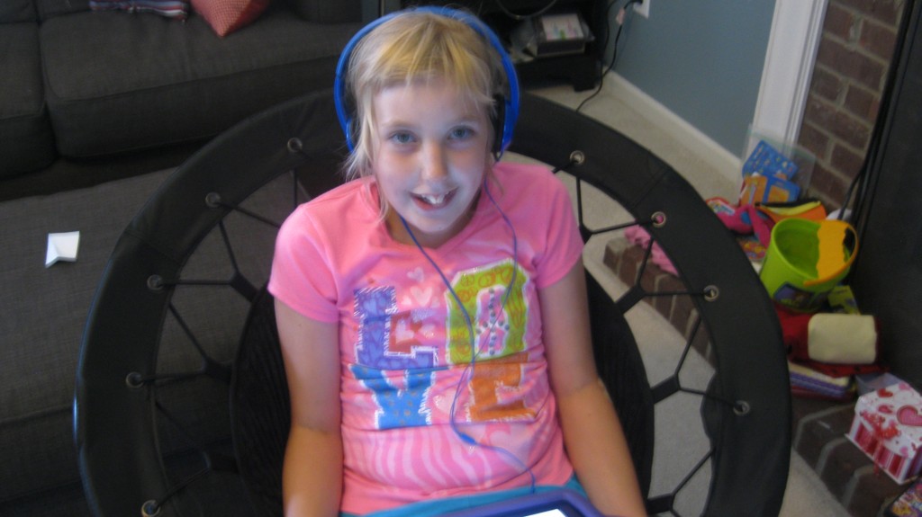 Maddie and her new headphones. 